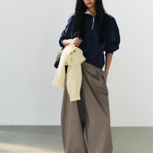 ASYMMETRIC WAIST PLEATED TROUSERS