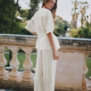 WIDE-LEG PLEATED TROUSERS