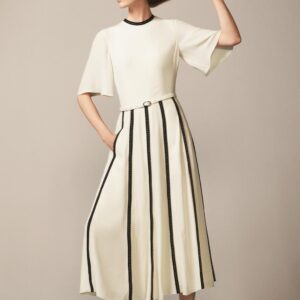 DRESS WITH CONTRASTING STRAPS AND STUDS - THE ITEM