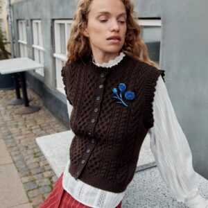 CABLE-KNIT WAISTCOAT WITH RUFFLES